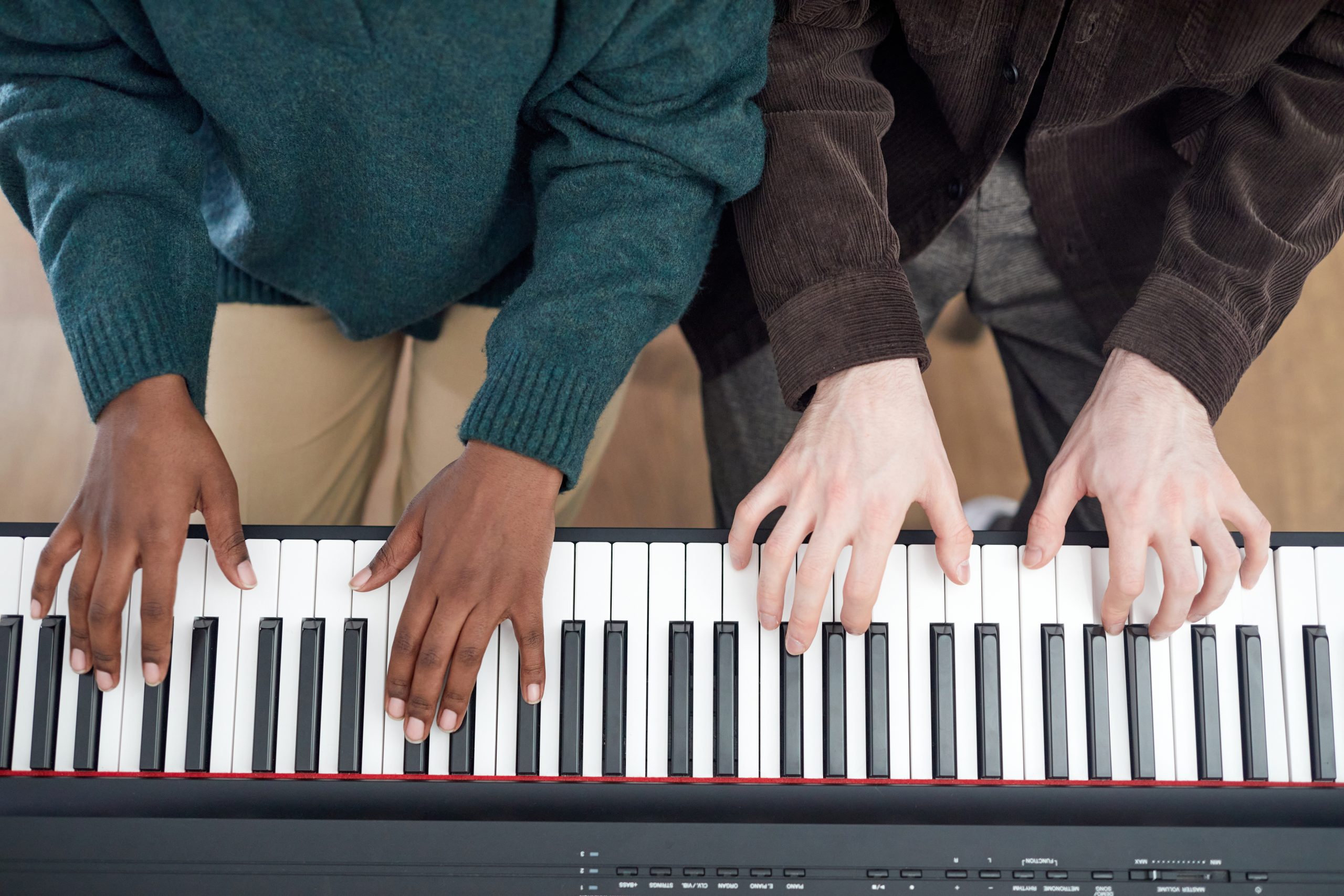 two people playing piano together in harmony 2026 03 24 07 56 36 utc